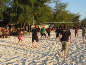 Volleyball. Muzungus against the locals. They brought six packs we brought a keg