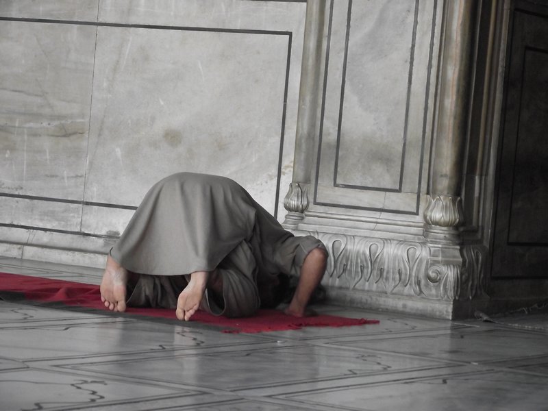 Praying Muslim man