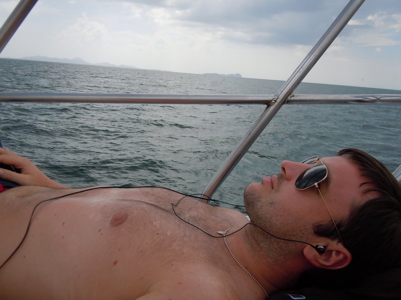 Ryan catching some rays on the front of the boat