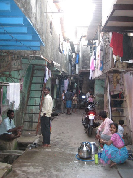 A street in the Dharavi Slum in Mumbai Photo