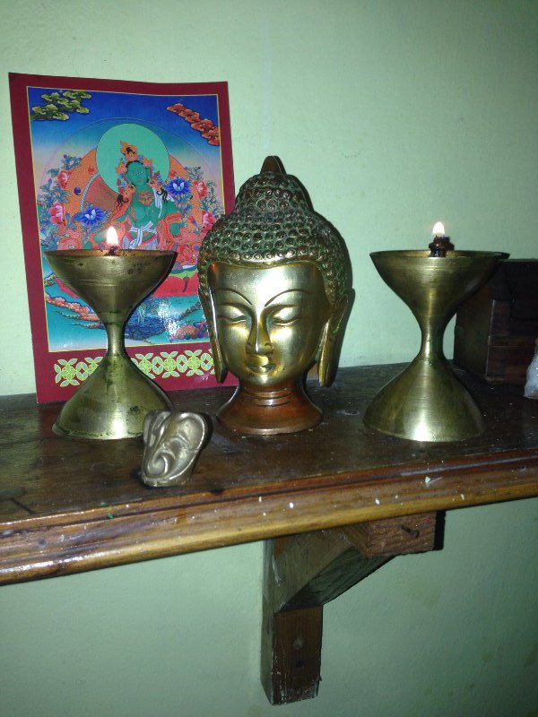 My little Buddha head and oil lamps