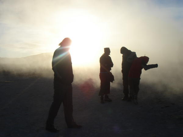 Sunrise at the geysers.. trying to stay warm in the smelly steam! 