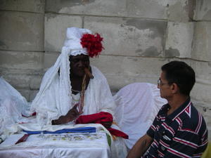 Voodoo lady reading tarot cards