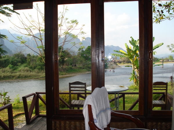 The $25 View From Our Bed in Vang Vieng