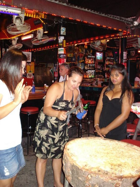 Rinna playing with the bargirls.