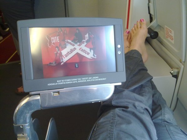 Leg room galore and my own touchscreen on demand entertainment system for $10