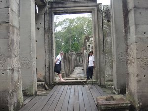 Jak and a boy posing at Angkor Thom