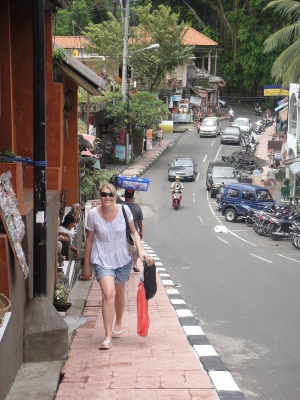 Nat walking up the little street