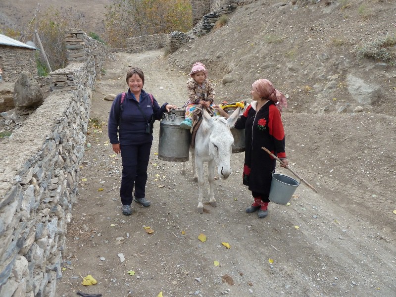 A lady and her daughter fetching water in Sentyab