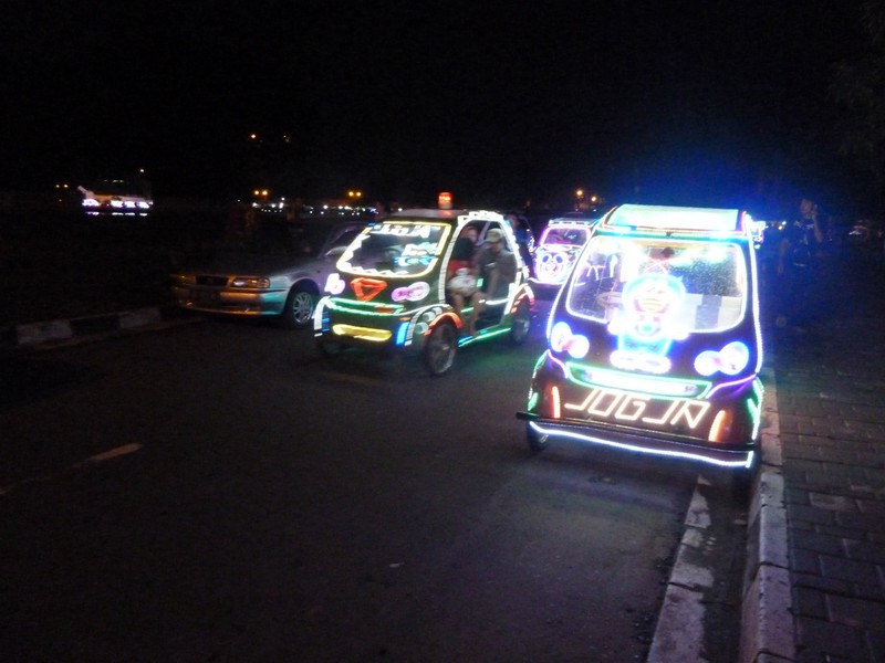 Pedal cars orbiting the alun-alun kidul just South of the Sultan's Palace