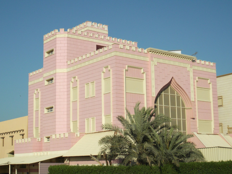 Pale pink building in the backstreets of the city (Kuwait City; Kuwait)