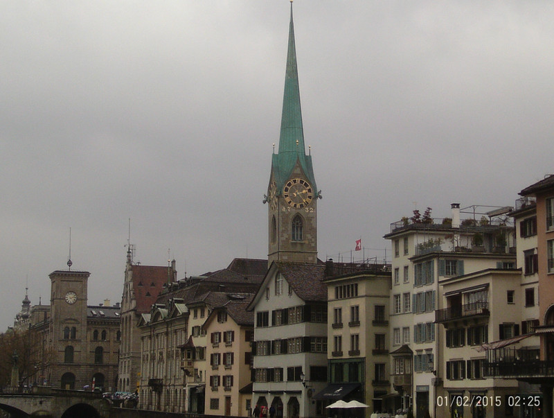 A church spire towers above all (Zurich; Switzerland)