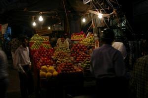 Fruit seller at night