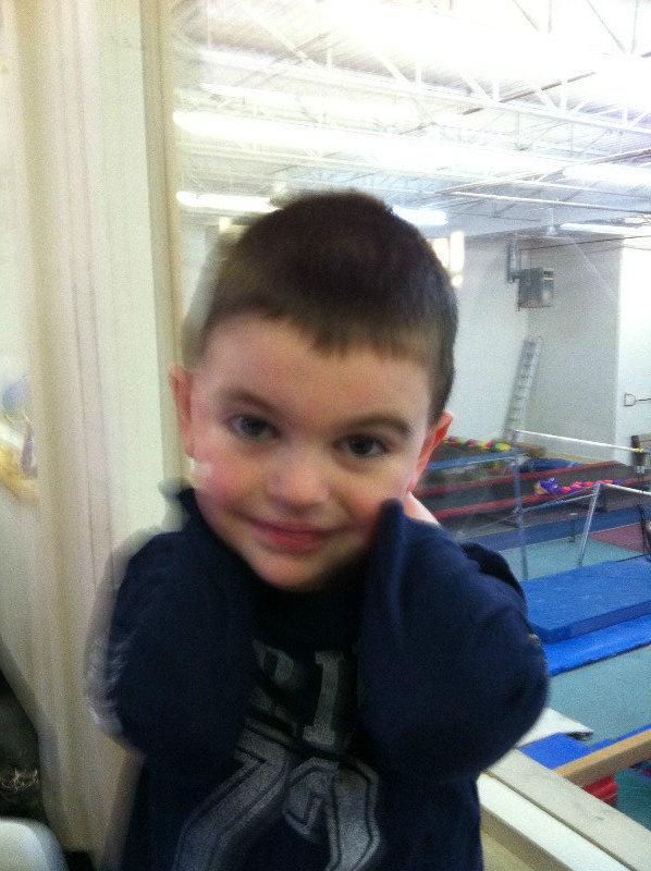 Matthew at his sister's gymnastics 