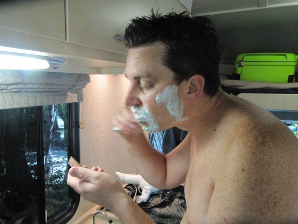 Matt shaving off his honeymoon scruff