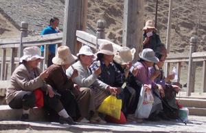 Tibetan ladies take time out for a refreshing ice-block