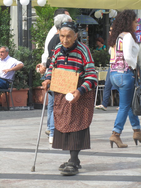 Sicilian woman begging