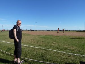 G watching a football game in Uruguay