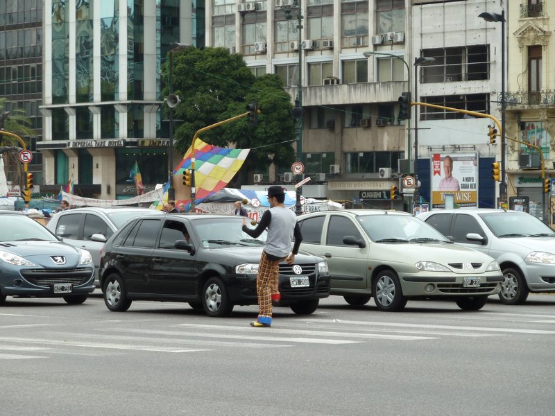 An entrepreneur - juggling in front of the traffic on Ave Julio (the one with 17 lanes of traffic!)