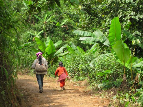 Locals walking toward their remote home