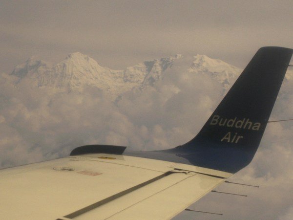 Buddha air...flying over the clouds and along the Himalayan