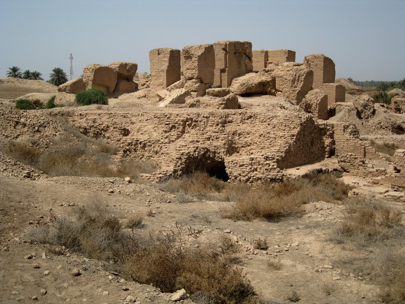 Escavated temple surrounded by ruins