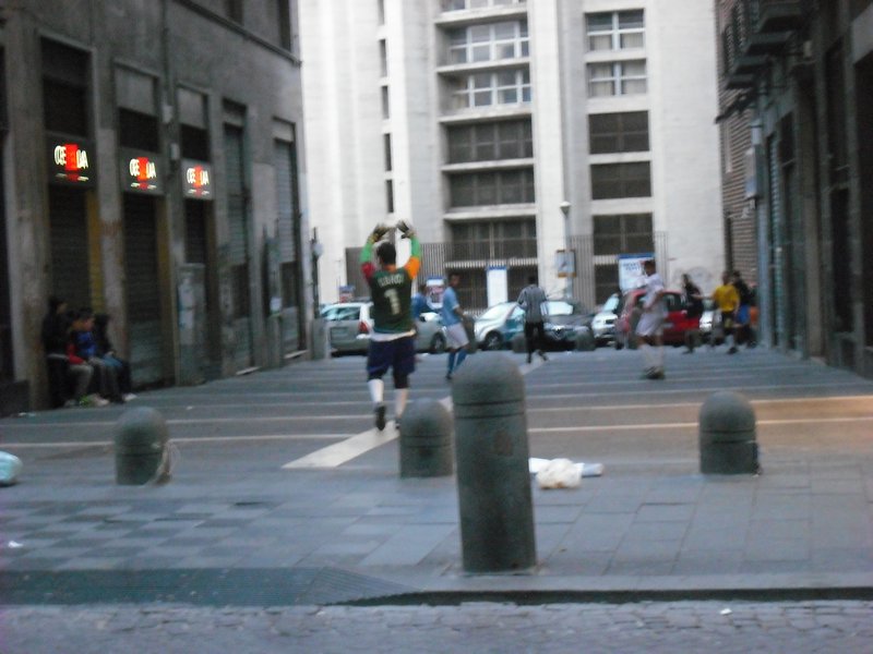 italian boys playing street soccer :D