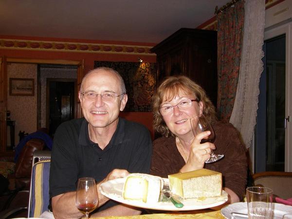 Corinne's father Gerard, & Julien's mother Michelle with the third course of our fab dinner - cheese from Haute Savoie & Alsace.