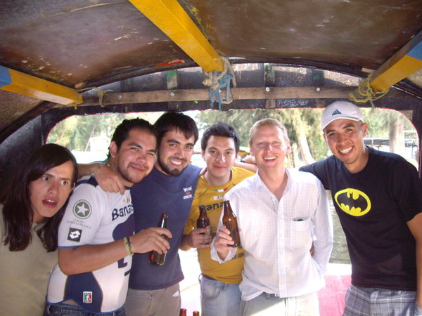 On the boat in Xochimilco with Mexican guys