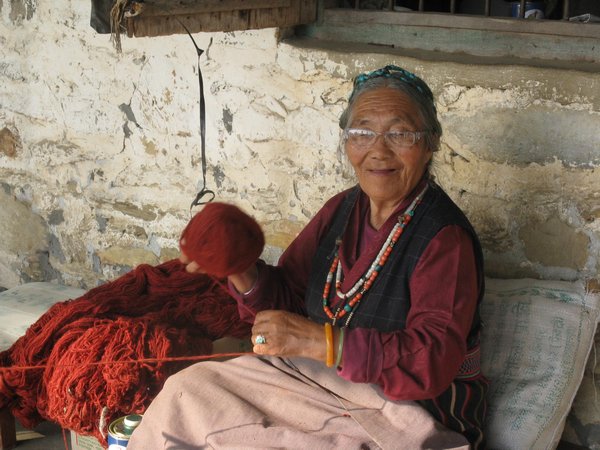 Winding yarn at Tibetan Carpet Center