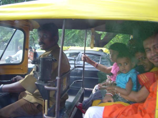 Family of at least 5 in an auto rickshaw
