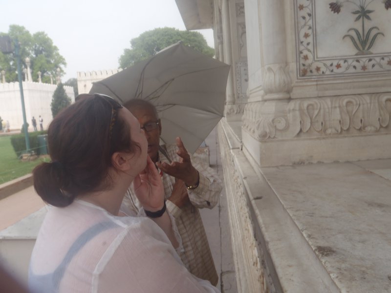 Debbie listening to our guide at Red Fort