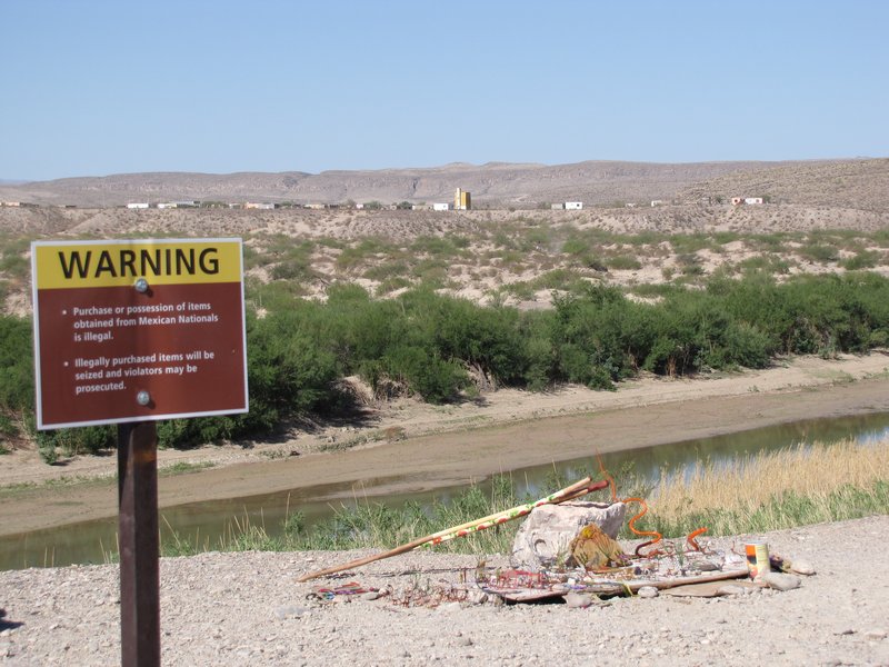 412-48 Warning against purchasing Mexican goods; town of Boquillas in background