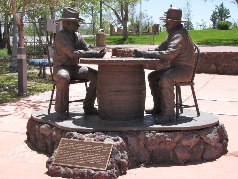 412-90 Statue commemorating the poker game that established town name