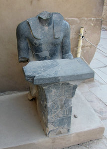 1304-352 Basalt or marble statue in another section