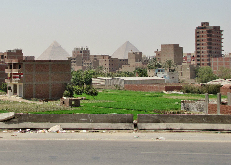 1304-403 The Great Pyramids from highway between Giza and Cairo