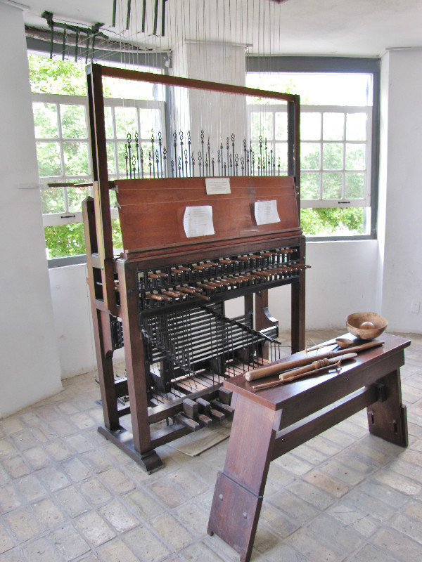 1311-84 Curacao Museum--the carillon keyboard and other tools on bench