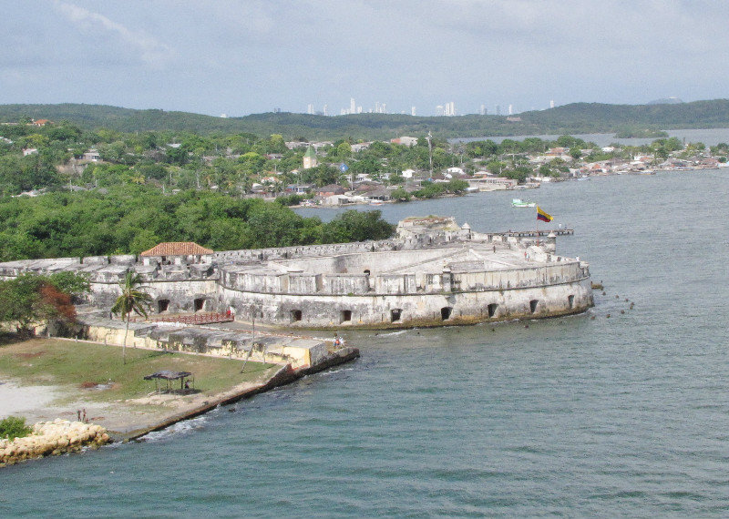 1311-160 Protective fort and entrance to bay with modern skyscrapers in background