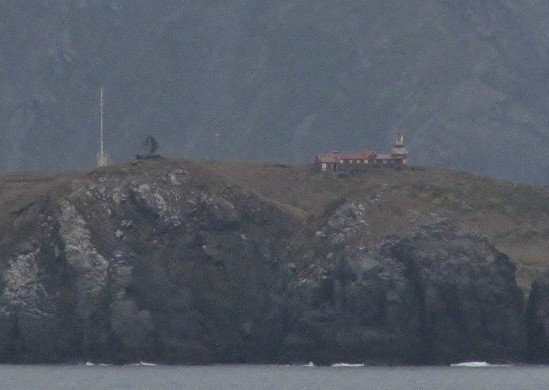 1312-222 After circling--Chilean Cost Guard Station on Cape Horn with albatross statue