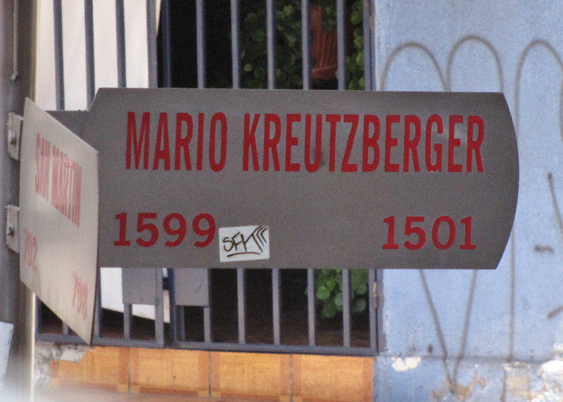 1312-533 Street sign showing evidence of diverse cultures