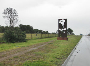 1403-203 One of several large metal scupltures lining major road into Bloemfontein--the rose city
