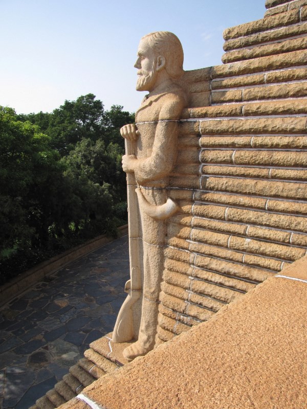 2104-27 Voortrekker Monument, Pretoria--Corner Sculpture of Voortrekker near entryway