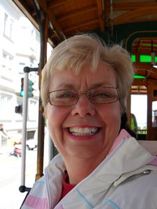 Mom happy as a clam riding on the Cable Cars