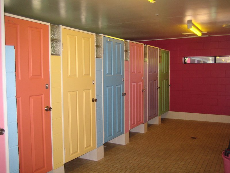 The multi coloured doors in the ladies toilet