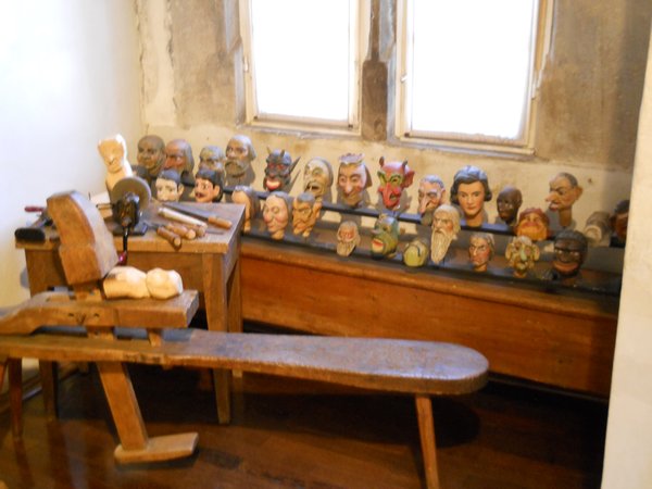 Puppet heads and worker's bench