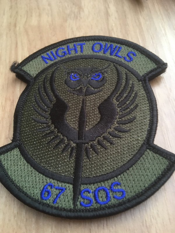 67 SOS badge
