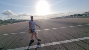 Walking across runway