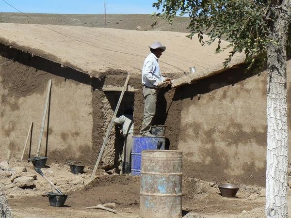Making a mud-brick house, Yavi