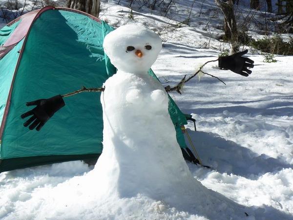 Our snowwoman protects our humble campsite for the night