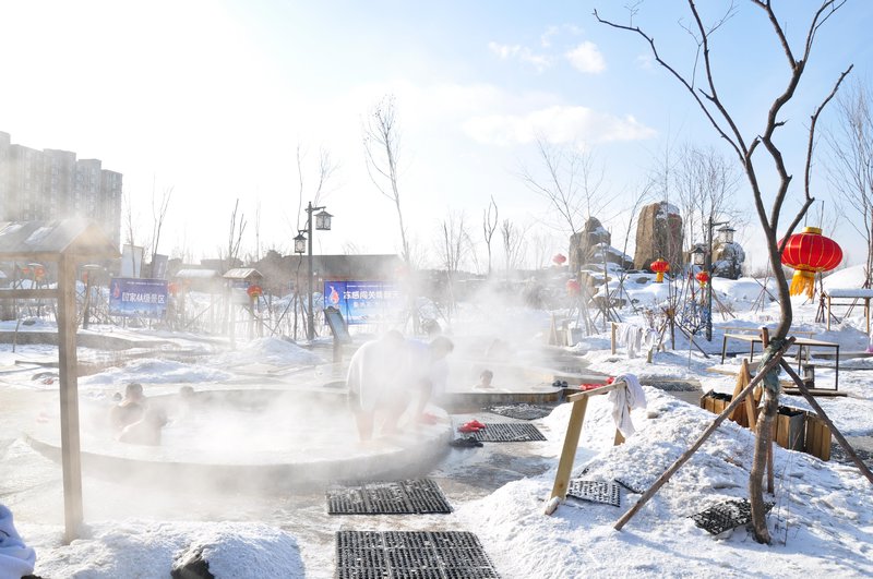 Hot spring surrounding by snows